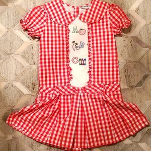 Red and white plaid schoolgirl dress.